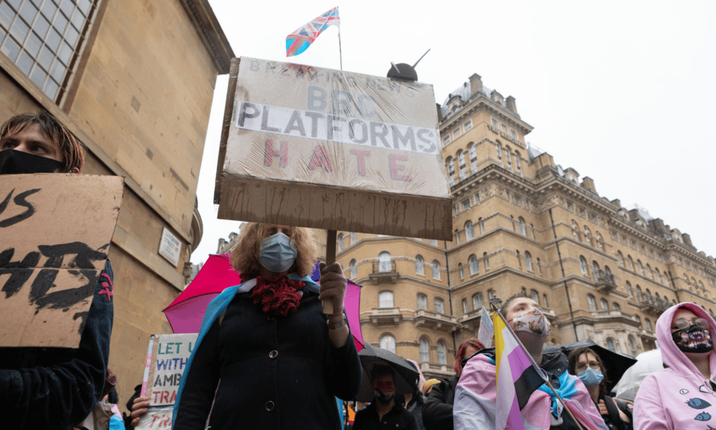 A protestor seen holding a placard that says 'Breaking News: BBC platforms hate' during the demonstration.
