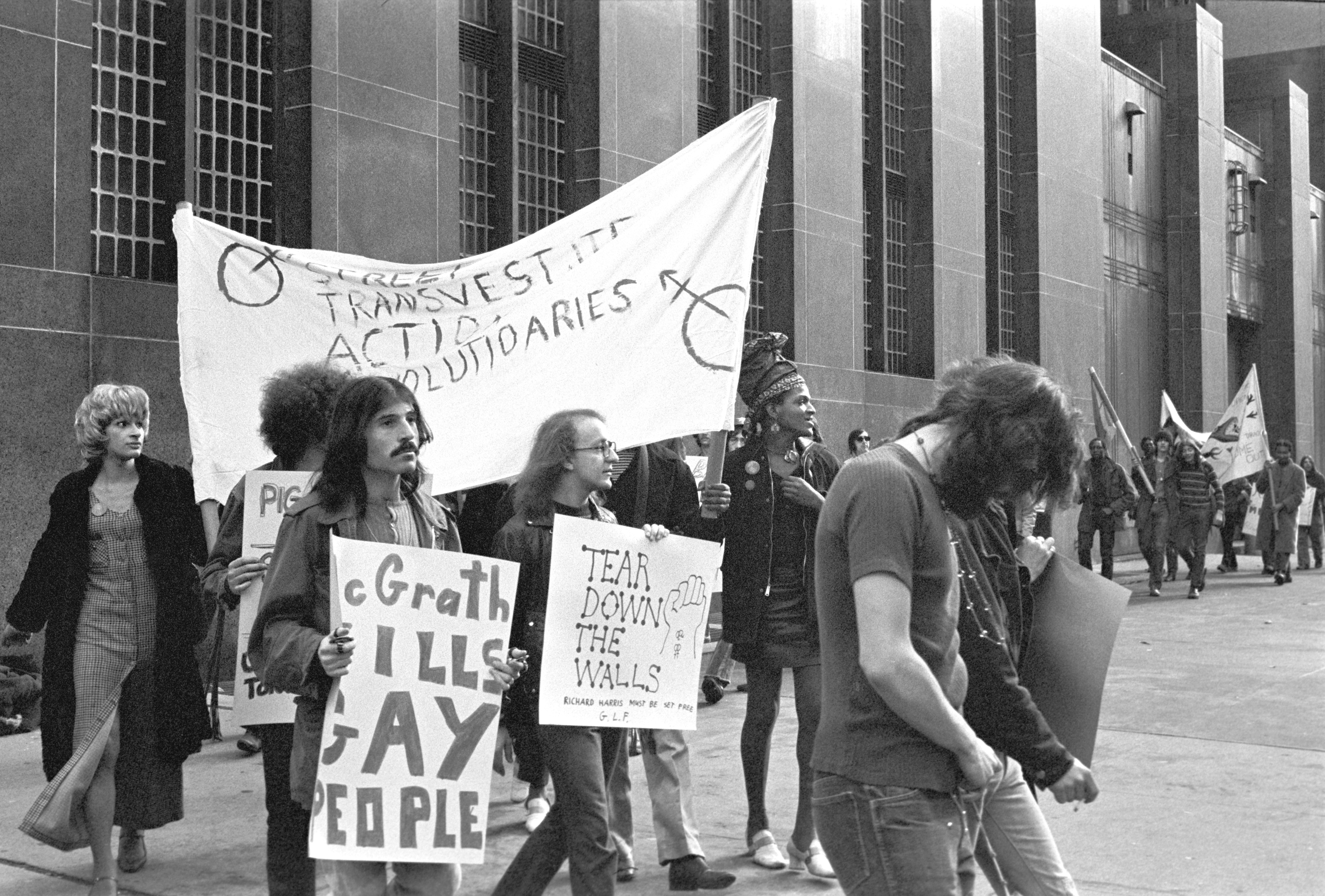 Sylvia Rivera and Marsha P. Johnson marching with the Street Transvestite Action Revolutionaries.