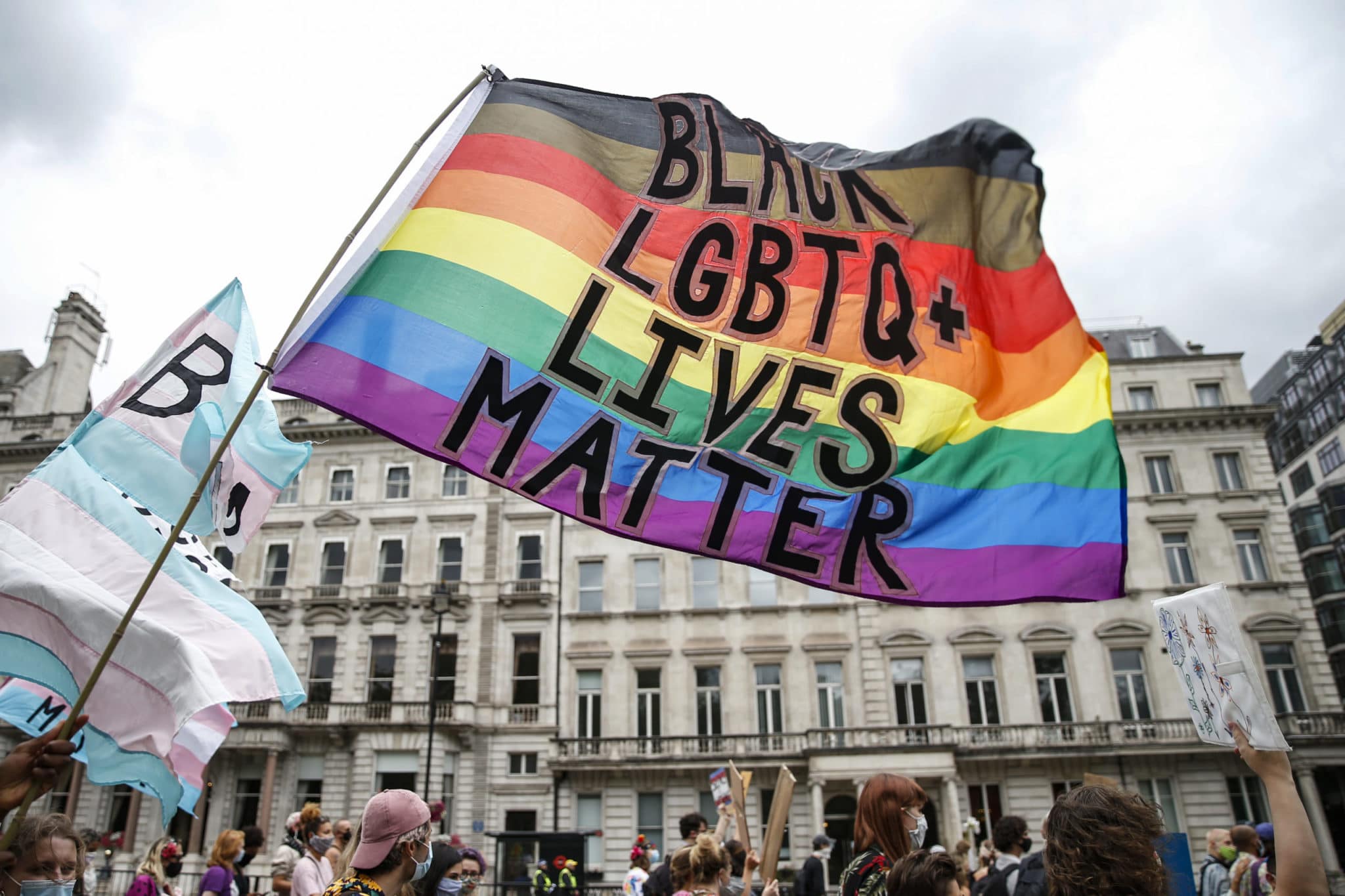 Pride flag with 'Black LGBT+ Lives Matter' text. 