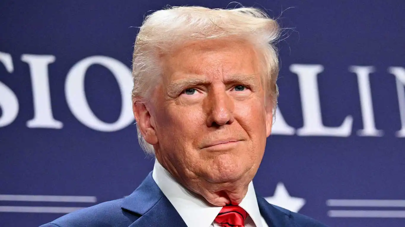 US President Donald Trump looks on after delivering remarks at the House Republican Members Conference Dinner at Trump National Doral Miami, in Miami, Florida.